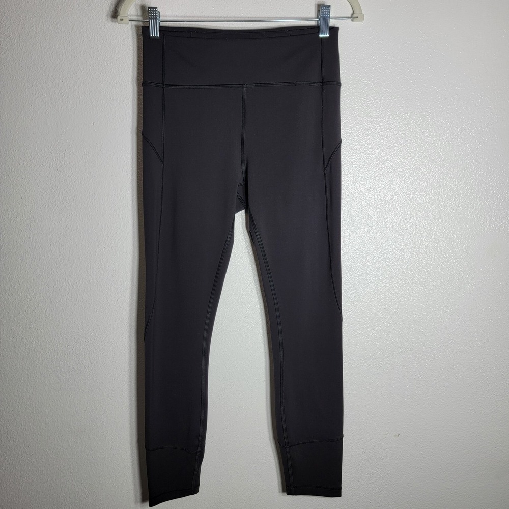Lululemon In Movement Black Leggings Size 8 Everlux 25"  7/8 Tight High Rise